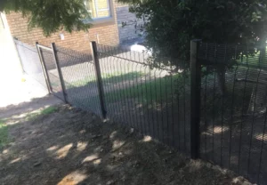 Black Plastic-Coated Fence On Gradient