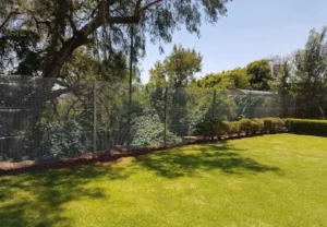 Galvanised Fencing Securing A Garden